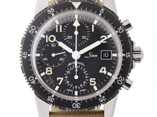 Title: Fliegerchronograph 103 stål med mekanisk kronografværk (New)
Brand: Sinn
Model: Fliegerchronograph
Ref: 103
Category: Pilot
Diameter: 40mm
Functions: Kronograf, Dato
Year: 1990
Price: 19000
Condition: undefined
Dial Color: Sort
Strap: Stof
Case material: Stål
Gender: Herre
Match: 100.0%
Billedet er ejet af Bruun Rasmussen (417510) Et Sinn ur