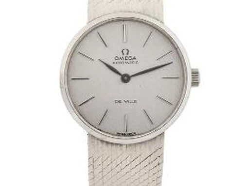 Title: De Ville of 14k white gold, ref. 751.7281, 1973 (New)
Brand: Omega
Model: De Ville
Ref: 751.7281
Category: Dress
Diameter: 24mm
Functions: Dato
Year: 1973
Price: 19000
Condition: undefined
Dial Color: Hvid
Strap: Metal
Case material: Guld
Gender: Dame
Match: 100.0%
Billedet er ejet af Bruun Rasmussen (467466) Et Omega ur