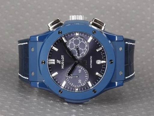 Title: Classic Champions League Chrono Edt
Brand: Hublot
Model: Classic Fusion Chronograph Champions League Edition
Ref: 521.EX.7170.LR.UCL18
Category: Sport
Diameter: 45mm
Functions: Dato, Kronograf
Year: 2019
Price: 84000
Condition: undefined
Dial Color: Blå
Strap: Læder
Case material: Keramik
Gender: Herre
Match: 100.0%
Billedet er ejet af Chrono (101396) Et Hublot ur