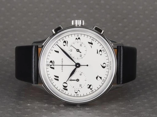 Title: Heritage Classic Chrono 1946
Brand: Longines
Model: Heritage Classic Chronograph 1946
Ref: L2.827.4.73.0
Category: Dress
Diameter: 40mm
Functions: Kronograf
Year: 2020
Price: 17000
Condition: undefined
Dial Color: Hvid
Strap: Læder
Case material: Stål
Gender: Herre
Match: 100.0%
Billedet er ejet af Chrono (101394) Et Longines ur