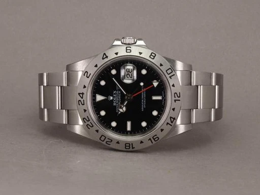 Title: Explorer II 16570 Cal. 3186
Brand: Rolex
Model: Explorer II 3186
Ref: 16570
Category: Sport
Diameter: 40mm
Functions: GMT, Dato
Year: 2007
Price: 51000
Condition: undefined
Dial Color: Sort
Strap: Metal
Case material: Stål
Gender: Herre
Match: 100.0%
Billedet er ejet af Chrono (315649) Et Rolex ur