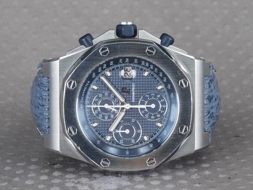 Title: ROO Chrono 25770ST
Brand: Audemars Piguet
Model: Royal Oak Offshore Chronograph
Ref: 25770ST.OO.0009.01
Category: Racing
Diameter: 42mm
Functions: Kronograf, Dato
Year: 2003
Price: 110000
Condition: undefined
Dial Color: Blå
Strap: Andet
Case material: Stål
Gender: Herre
Match: 100.0%
Billedet er ejet af Chrono (117997) Et Audemars Piguet ur