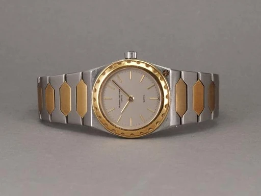 Title: Lady G/S "222" (New)
Brand: Vacheron Constantin
Model: 222 Lady Quartz
Ref: 60001
Category: Dress
Diameter: 24mm
Functions: 
Year: null
Price: 61000
Condition: undefined
Dial Color: Grå
Strap: Metal
Case material: Stål
Gender: Dame
Match: 100.0%
Billedet er ejet af Chrono (429201) Et Vacheron Constantin ur