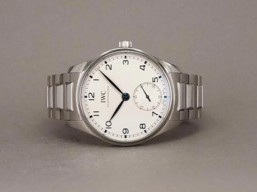 Title: Portugieser 40 - IW358312 - 4/22
Brand: IWC
Model: Portugieser Automatic 40
Ref: IW358312
Category: Dress
Diameter: 40mm
Functions: Dato
Year: 2022
Price: 45000
Condition: undefined
Dial Color: Hvid
Strap: Metal
Case material: Stål
Gender: Herre
Match: 100.0%
Billedet er ejet af Chrono (381448) Et IWC ur