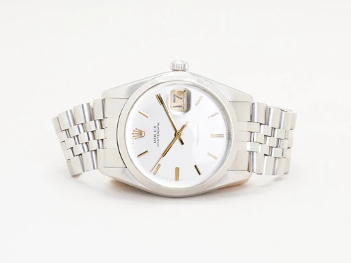 Title: Oysterdate Precision
Brand: Rolex
Model: Oysterdate Precision
Ref: 6694
Category: Dress
Diameter: 34mm
Functions: Dato
Year: 1978
Price: 18499
Condition: 7.0
Dial Color: Hvid
Strap: Metal
Case material: Stål
Gender: Herre
Match: 100.0%
Billedet er ejet af Chrono Collective (436022) Et Rolex ur