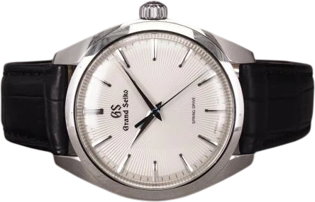 Title: Spring Drive SBGY003
Brand: Grand Seiko
Model: Spring Drive 20th anniversary
Ref: SBGY003
Category: Dress
Diameter: 38mm
Functions:
Year: 2019
Price: 65000
Condition: 8.0
Dial Color: Hvid
Strap: Læder
Case material: Stål
Gender: Herre
Match: 100.0%
Billedet er ejet af Chrono (101177) Et Grand Seiko ur