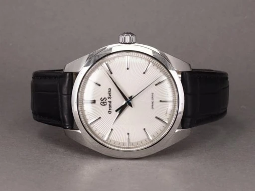 Title: Spring Drive SBGY003
Brand: Grand Seiko
Model: Spring Drive 20th anniversary
Ref: SBGY003
Category: Dress
Diameter: 38mm
Functions:
Year: 2019
Price: 65000
Condition: undefined
Dial Color: Hvid
Strap: Læder
Case material: Stål
Gender: Herre
Match: 100.0%
Billedet er ejet af Chrono (101177) Et Grand Seiko ur