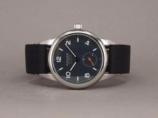 Title: Club - NO-741
Brand: Nomos Glashütte
Model: Club
Ref: NO-741
Category: Sport
Diameter: 37mm
Functions: 
Year: 2023
Price: 14000
Condition: undefined
Dial Color: Blå
Strap: Stof
Case material: Stål
Gender: Herre
Match: 100.0%
Billedet er ejet af Chrono (331873) Et Nomos Glashütte ur
