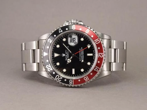 Title: GMT-Master II 16710 - DK 1/1997 (Coke)
Brand: Rolex
Model: GMT-Master II Coke
Ref: 16710
Category: Pilot
Diameter: 40mm
Functions: GMT, Dato
Year: 1996
Price: 80000
Condition: undefined
Dial Color: Sort
Strap: Metal
Case material: Stål
Gender: Herre
Match: 100.0%
Billedet er ejet af Chrono (386163) Et Rolex ur