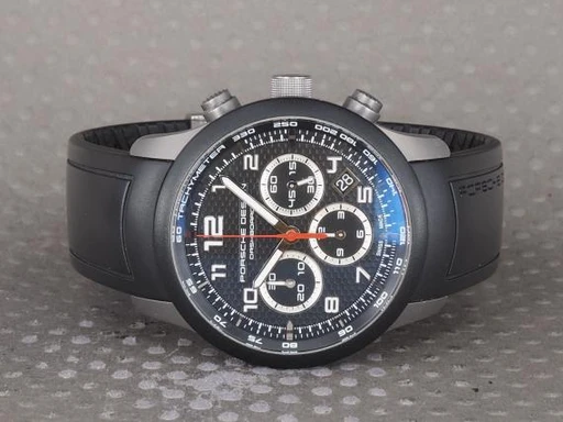 Title: P6612 Dashboard
Brand: Porsche Design
Model: P6612 Dashboard
Ref: 6612.15.45
Category: Racing
Diameter: 42mm
Functions: Kronograf, Dato
Year: 2010
Price: 17000
Condition: undefined
Dial Color: Sort
Strap: Andet
Case material: Titanium
Gender: Herre
Match: 100.0%
Billedet er ejet af Chrono (101363) Et Porsche Design ur