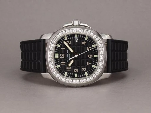 Title: Aquanaut 5067A-001
Brand: Patek Philippe
Model: Aquanaut
Ref: 5067A-001
Category: Sport
Diameter: 35mm
Functions: Dato
Year: 2008
Price: 260000
Condition: 7.0
Dial Color: Sort
Strap: Gummi
Case material: Stål
Gender: Unisex
Match: 100.0%
Billedet er ejet af Chrono (492615) Et Patek Philippe ur