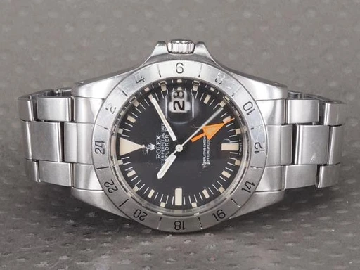 Title: Explorer II 1655 Straight Hand - DK sæt
Brand: Rolex
Model: Explorer II Straight Hand Mk1
Ref: 1655
Category: Sport
Diameter: 40mm
Functions: Dato, GMT
Year: 1973
Price: 165000
Condition: undefined
Dial Color: Sort
Strap: Metal
Case material: Stål
Gender: Herre
Match: 100.0%
Billedet er ejet af Chrono (101361) Et Rolex ur