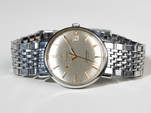 Title: Seamaster DeVille
Brand: Omega
Model: Seamaster DeVille
Ref: 166020
Category: Dress
Diameter: 34mm
Functions: Dato
Year: 1965
Price: 7499
Condition: 7.0
Dial Color: Sølv
Strap: Metal
Case material: Stål
Gender: Herre
Match: 100.0%
Billedet er ejet af Chrono Collective (494751) Et Omega ur