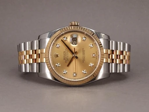 Title: Datejust G/S 116233 - Diamant skive (New)
Brand: Rolex
Model: Datejust G/S
Ref: 116233
Category: Dress
Diameter: 36mm
Functions: Dato
Year: 2010
Price: 70000
Condition: 8.0
Dial Color: Gul
Strap: Metal
Case material: Stål
Gender: Herre
Match: 100.0%
Billedet er ejet af Chrono (536857) Et Rolex ur