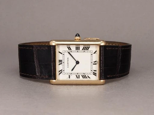 Title: Tank Jumbo "Paris" Automatique 18K
Brand: Cartier
Model: Tank Jumbo Automatique 18K
Ref: 17002
Category: Dress
Diameter: 28mm
Functions:
Year: 1970
Price: 145000
Condition: undefined
Dial Color: Hvid
Strap: Læder
Case material: Guld
Gender: Dame
Match: 100.0%
Billedet er ejet af Chrono (101012) Et Cartier ur