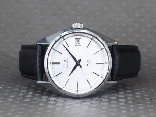 Title: Reissue SCVN001
Brand: King Seiko
Model: King Seiko Reissue Limited Edition Historical Collection
Ref: SCVN001
Category: Dress
Diameter: 36mm
Functions: Dato
Year: 2000
Price: 12000
Condition: undefined
Dial Color: Hvid
Strap: Læder
Case material: Stål
Gender: Herre
Match: 100.0%
Billedet er ejet af Chrono (101240) Et King Seiko ur