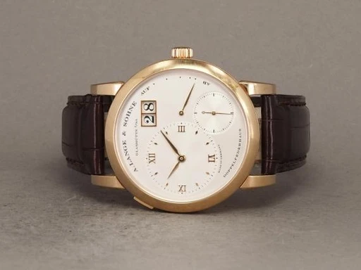 Title: Lange 1 101.032
Brand: A. Lange & Söhne
Model: Lange 1
Ref: 101.032
Category: Dress
Diameter: 38mm
Functions: Dato
Year: 2011
Price: 175000
Condition: undefined
Dial Color: Sølv
Strap: Læder
Case material: Guld
Gender: Herre
Match: 100.0%
Billedet er ejet af Chrono (139094) Et A. Lange & Söhne ur