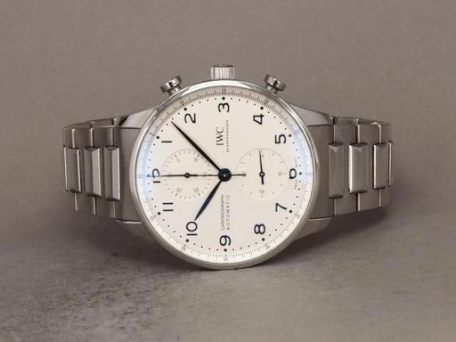 Title: Portuguese IW371617 - 2022
Brand: IWC
Model: Portuguese Chronograph
Ref: IW371617
Category: Racing
Diameter: 41mm
Functions: Kronograf
Year: 2022
Price: 48000
Condition: 8.0
Dial Color: Hvid
Strap: Metal
Case material: Stål
Gender: Herre
Match: 100.0%
Billedet er ejet af Chrono (137392) Et IWC ur