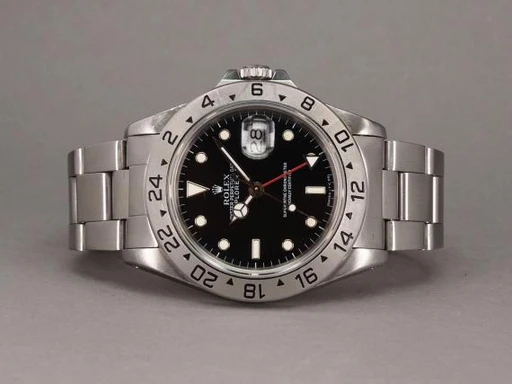 Title: Explorer II 16570 - N serie (New)
Brand: Rolex
Model: Explorer II
Ref: 16570
Category: Sport
Diameter: 40mm
Functions: Dato, GMT
Year: 1992
Price: 45000
Condition: undefined
Dial Color: Sort
Strap: Metal
Case material: Stål
Gender: Herre
Match: 100.0%
Billedet er ejet af Chrono (443143) Et Rolex ur