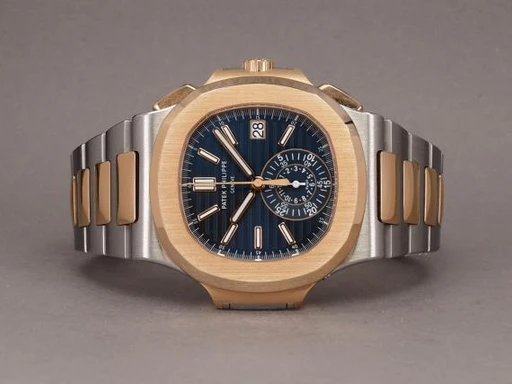 Title: Nautilus Chrono 5980/1AR-001 (New)
Brand: Patek Philippe
Model: Nautilus Chronograph G/S
Ref: 5980/1AR-001
Category: Sport
Diameter: 40mm
Functions: Kronograf, Dato
Year: 2021
Price: 710000
Condition: 10.0
Dial Color: Blå
Strap: Metal
Case material: Stål
Gender: Herre
Match: 100.0%
Billedet er ejet af Chrono (536854) Et Patek Philippe ur