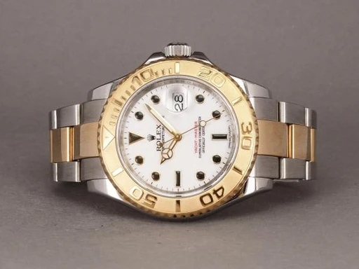 Title: Yacht-Master G/S 16623
Brand: Rolex
Model: Yacht-Master G/S
Ref: 16623
Category: Sport
Diameter: 40mm
Functions: Dato
Year: 2009
Price: 82000
Condition: undefined
Dial Color: Hvid
Strap: Metal
Case material: Guld
Gender: Herre
Match: 100.0%
Billedet er ejet af Chrono (101161) Et Rolex ur