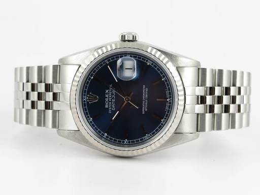 Title: Datejust 36 16234
Brand: Rolex
Model: Datejust 36
Ref: 16234
Category: Dress
Diameter: 36mm
Functions: Dato
Year: 1995
Price: 49990
Condition: undefined
Dial Color: Blå
Strap: Metal
Case material: Stål
Gender: Unisex
Match: 100.0%
Billedet er ejet af Dreamwatch (299088) Et Rolex ur