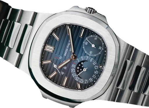 Title: Nautilus Ref. 5712/1a
Brand: Patek Philippe
Model: Nautilus 5712/1a
Ref: 5712/1a
Category: Sport
Diameter: nullmm
Functions: Månefase, Dato
Year:
Price:
Condition: 10.0
Dial Color: Blå
Strap: Metal
Case material: Stål
Gender: Herre
Match: 100.0%
Billedet er ejet af ETP Watches (155471) Et Patek Philippe ur