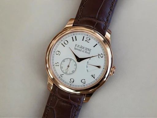 Title: Chronomètre Souverain
Brand: F.P. Journe
Model: Chronomètre Souverain
Ref: null
Category: Dress
Diameter: nullmm
Functions: Dato
Year: null
Price: null
Condition: undefined
Dial Color: Hvid
Strap: Læder
Case material: Guld
Gender: Herre
Match: 100.0%
Billedet er ejet af ETP Watches (155466) Et F.P. Journe ur