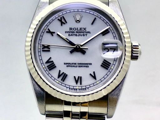 Title: Datejust 31mm
Brand: Rolex
Model: Oyster Perpetual Datejust
Ref: 68274
Category: Dress
Diameter: 31mm
Functions: Dato
Year: 1995
Price: 48000
Condition:
Dial Color: Hvid
Strap: Metal
Case material: Stål
Gender: Unisex
Match: 100.0%
Billedet er ejet af Franz Jaeger & Me (248230) Et Rolex ur