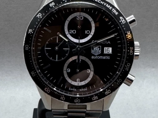 Title: Carrera Calibre 16 (New)
Brand: Tag Heuer
Model: Carrera
Ref: CV2010
Category: Racing
Diameter: 41mm
Functions: Kronograf, Dato
Year: 2009
Price: 15000
Condition: undefined
Dial Color: Sort
Strap: Metal
Case material: Stål
Gender: Herre
Match: 100.0%
Billedet er ejet af Franz Jaeger & Me (418433) Et Tag Heuer ur
