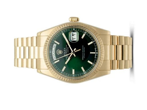 Title: Day-Date 36mm
Brand: Rolex
Model: Day-Date
Ref: 118238
Category: Dress
Diameter: 36mm
Functions: Dato, Ugedag
Year: 2000
Price: 249500
Condition: undefined
Dial Color: Grøn
Strap: Metal
Case material: Guld
Gender: Herre
Match: 100.0%
Billedet er ejet af Hvelplund (102444) Et Rolex ur
