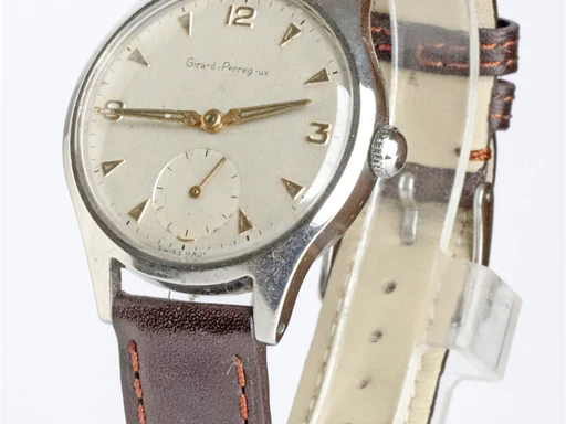 Title: Girard Perregaux
Brand: Girard-Perregaux
Model:
Ref: KU2917
Category: Dress
Diameter: 34mm
Functions:
Year: 1960
Price: 4000
Condition: undefined
Dial Color: Hvid
Strap: Læder
Case material: Stål
Gender: Herre
Match: 100.0%
Billedet er ejet af Krognos (102313) Et Girard-Perregaux ur