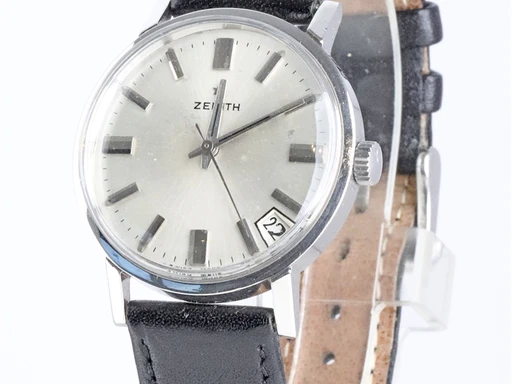 Title: dressur med manuelt optræk fra 1960'erne
Brand: Zenith
Model: 
Ref: KU3302
Category: Dress
Diameter: 34mm
Functions: Dato
Year: 1960
Price: 4800
Condition: undefined
Dial Color: Sølv
Strap: Læder
Case material: Stål
Gender: Herre
Match: 100.0%
Billedet er ejet af Krognos (102330) Et Zenith ur