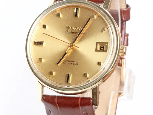 Title: Ambassador Automatic
Brand: Bulova
Model: 
Ref: KU2966/1-556493
Category: Dress
Diameter: 35mm
Functions: Dato
Year: 1960
Price: 4000
Condition: undefined
Dial Color: Guld
Strap: Læder
Case material: Stål
Gender: Herre
Match: 100.0%
Billedet er ejet af Krognos (102272) Et Bulova ur