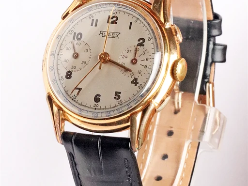 Title: Kronograf
Brand: Hugex
Model: Hugex Kronograf
Ref: KU1990 / 87589
Category: Racing
Diameter: 36mm
Functions: Kronograf, Dato
Year: 1950
Price: 5000
Condition: undefined
Dial Color: Hvid
Strap: Læder
Case material: Guld
Gender: Herre
Match: 100.0%
Billedet er ejet af Krognos (102294) Et Hugex ur