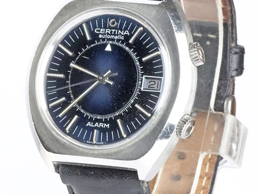 Title: Automatic Alarm
Brand: Certina
Model: 
Ref: KU2724
Category: Dress
Diameter: 40mm
Functions: Dato
Year: 1970
Price: 9800
Condition: undefined
Dial Color: Sort
Strap: Læder
Case material: Stål
Gender: Herre
Match: 100.0%
Billedet er ejet af Krognos (102269) Et Certina ur