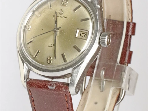 Title: DS
Brand: Certina
Model: 
Ref: KU2616
Category: Dress
Diameter: 36mm
Functions: Dato
Year: 1960
Price: 4500
Condition: undefined
Dial Color: Gul
Strap: Læder
Case material: Stål
Gender: Unisex
Match: 100.0%
Billedet er ejet af Krognos (102304) Et Certina ur