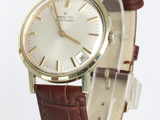 Title: Automatic
Brand: Zenith
Model: Automatic
Ref: KU3717
Category: Dress
Diameter: 34mm
Functions: Dato
Year: 1960
Price: 5200
Condition: undefined
Dial Color: Sølv
Strap: Læder
Case material: Guld
Gender: Herre
Match: 100.0%
Billedet er ejet af Krognos (135986) Et Zenith ur