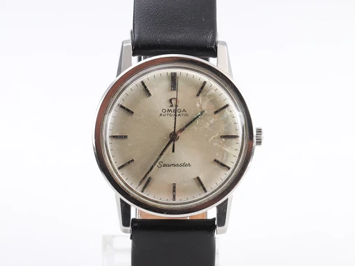 Title: 'Seamaster Automatic'. Vintage herreur i stål med sølvfarvet skive, ca. 1966
Brand: Omega
Model: Seamaster Automatic
Ref: 165.003
Category: Dress
Diameter: 34mm
Functions:
Year: 1966
Price: 5000
Condition: 5.0
Dial Color: Sølv
Strap: Læder
Case material: Stål
Gender: Herre
Match: 100.0%
Billedet er ejet af Lauritz (537746) Et Omega ur