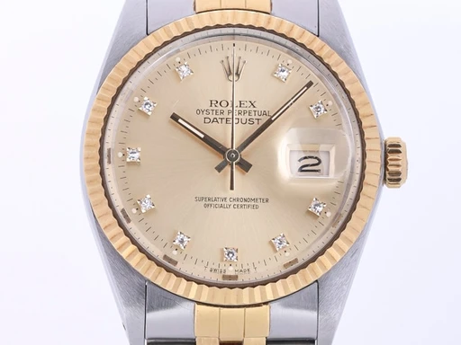 Title: Oyster Perpetual Datejust. Armbåndsur af 18 kt. guld og stål med diamanter
Brand: Rolex
Model: Oyster Perpetual Datejust
Ref: 16013G
Category: Dress
Diameter: 36mm
Functions: Dato
Year: null
Price: 52000
Condition: undefined
Dial Color: Gul
Strap: Metal
Case material: Guld
Gender: Herre
Match: 100.0%
Billedet er ejet af Lauritz (359656) Et Rolex ur