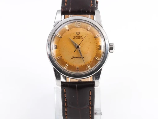 Title: Seamaster herreur med 'tropical' urskive (New)
Brand: Omega
Model: Seamaster
Ref: null
Category: Dress
Diameter: 34mm
Functions:
Year:
Price: 6200
Condition: 7.0
Dial Color: Gul
Strap: Læder
Case material: Stål
Gender: Herre
Match: 100.0%
Billedet er ejet af Lauritz (544884) Et Omega ur