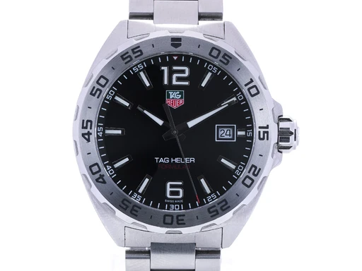 Title: Formula 1 herreur af stål, Ø 41 mm
Brand: Tag Heuer
Model: Formula 1
Ref: WAZ1112
Category: Sport
Diameter: 41mm
Functions: Dato
Year:
Price: 10000
Condition: 10.0
Dial Color: Sort
Strap: Metal
Case material: Stål
Gender: Herre
Match: 100.0%
Billedet er ejet af Lauritz (530719) Et Tag Heuer ur