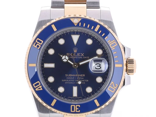 Title: Oyster Perpetual Submariner af guld og stål, ref. 116613LB, årgang 2018 (New)
Brand: Rolex
Model: Oyster Perpetual Submariner Date
Ref: 116613LB
Category: Dykker
Diameter: nullmm
Functions: Dato
Year: 2018
Price: 125000
Condition: undefined
Dial Color: Blå
Strap: Metal
Case material: Stål
Gender: Herre
Match: 100.0%
Billedet er ejet af Lauritz (450912) Et Rolex ur