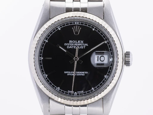 Title: Oyster Perpetual Datejust. Herrearmbåndsur af stål ref. 16014
Brand: Rolex
Model: Datejust
Ref: 16014
Category: Dress
Diameter: 36mm
Functions: Dato
Year: null
Price: 42000
Condition: undefined
Dial Color: Sort
Strap: Metal
Case material: Stål
Gender: Herre
Match: 100.0%
Billedet er ejet af Lauritz (354536) Et Rolex ur