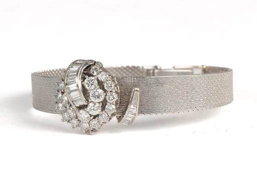 Title: . Cocktail damearmbåndsur af 18 kt. hvidguld prydet med talrige diamanter, i alt ca. 3.24 ct. (certf) (New)
Brand: Eterna
Model: Cocktail damearmbåndsur
Ref: null
Category: Dress
Diameter: 19mm
Functions:
Year: 1971
Price: 25000
Condition: undefined
Dial Color: Sølv
Strap: Metal
Case material: Guld
Gender: Dame
Match: 100.0%
Billedet er ejet af Lauritz (332768) Et Eterna ur
