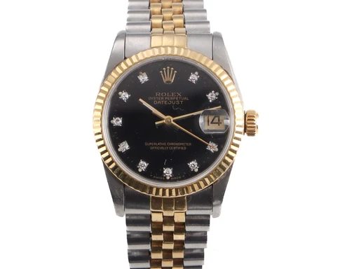 Title: damearmbåndsur, Datejust 31 med brillanter (New)
Brand: Rolex
Model: Oyster Perpetual Datejust
Ref: 68273
Category: Dress
Diameter: 31mm
Functions: Dato
Year: 1985
Price: 36000
Condition: 7.0
Dial Color: Sort
Strap: Metal
Case material: Stål
Gender: Dame
Match: 100.0%
Billedet er ejet af Lauritz (544882) Et Rolex ur