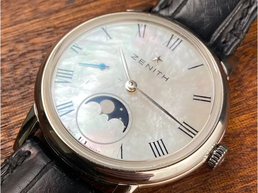 Title: Elite Lady Moonphase 36 mm.
Brand: Zenith
Model: Elite Lady Moonphase
Ref: 03.2320.692/81.C714
Category: Dress
Diameter: 36mm
Functions: Månefase
Year: 2020
Price: 22000
Condition: undefined
Dial Color: Hvid
Strap: Læder
Case material: Stål
Gender: Dame
Match: 100.0%
Billedet er ejet af Limited Watches (152377) Et Zenith ur