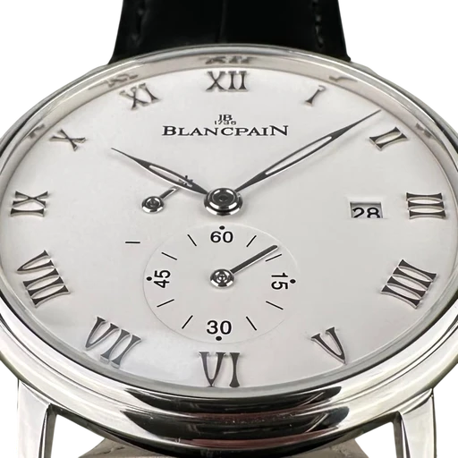 Title: Villeret Ultra-Slim - 40 mm. Med 2 nye remme.
Brand: Blancpain
Model: Villeret Ultra-Slim
Ref: 6606-1127-55B
Category: Dress
Diameter: 40mm
Functions: Dato
Year: 2018
Price: 40000
Condition: 9.0
Dial Color: Hvid
Strap: Læder
Case material: Stål
Gender: Herre
Match: 100.0%
Billedet er ejet af Limited Watches (312290) Et Blancpain ur
