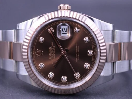 Title: Datejust 41 126331
Brand: Rolex
Model: Datejust 41
Ref: 126331
Category: Dress
Diameter: 41mm
Functions: Dato
Year: 2017
Price: 118000
Condition: undefined
Dial Color: Brun
Strap: Metal
Case material: Stål
Gender: Herre
Match: 100.0%
Billedet er ejet af MM Watches (101932) Et Rolex ur