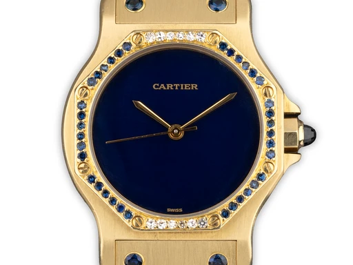 Title: Santos Ronde Octagon 'Or Massif' Sapphire
Brand: Cartier
Model: Santos Ronde Octagon 'Or Massif' Sapphire
Ref: 2965
Category: Dress
Diameter: 30mm
Functions: 
Year: 1980
Price: 250000
Condition: undefined
Dial Color: Blå
Strap: Andet
Case material: Guld
Gender: Unisex
Match: 100.0%
Billedet er ejet af Ole Mathiesen (121159) Et Cartier ur